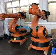 O ACRÉSCIMO R2700 do KR 210 do robô da segunda mão usou o robô de Kuka para a picareta e coloca muito estoque